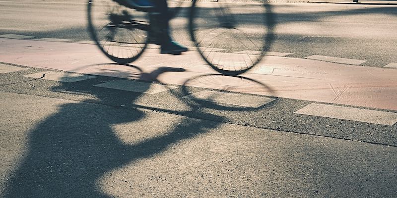 cyclist sunset street